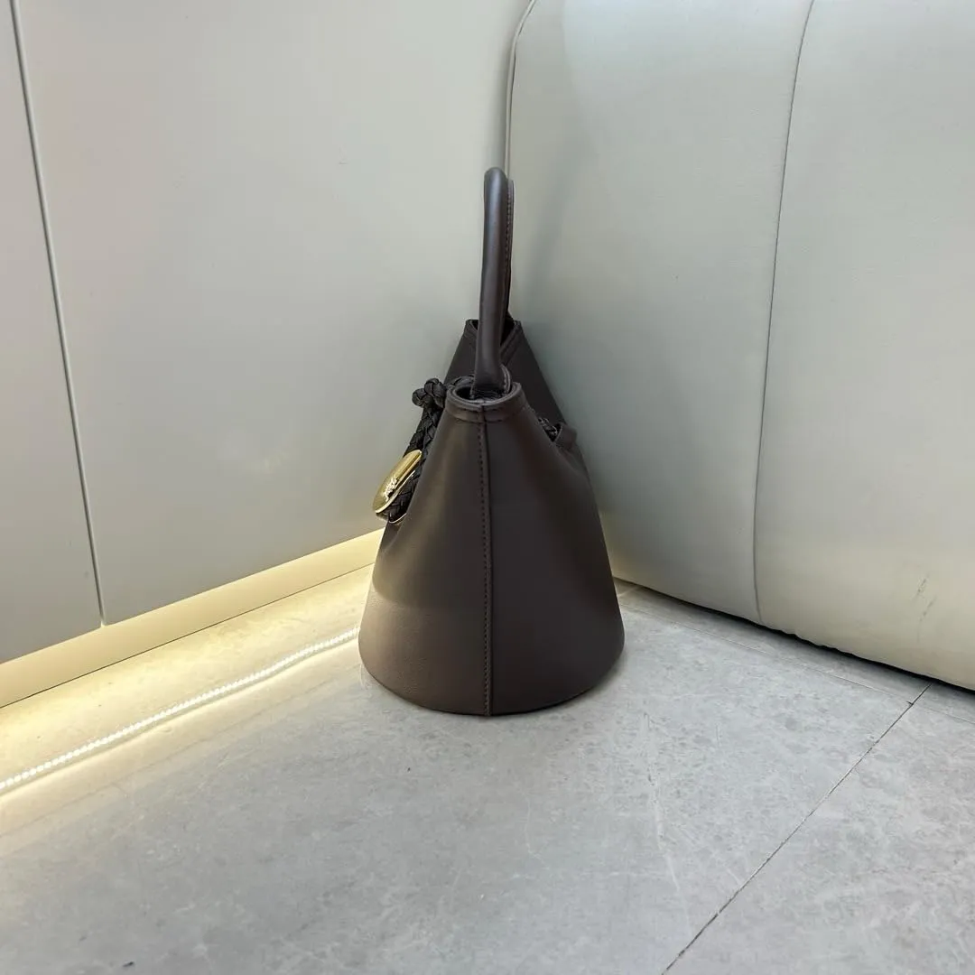 Genuine Leather Woven Bucket Bag for Women with Knot Closure  Versatile Handheld, Shoulder and Crossbody Bag